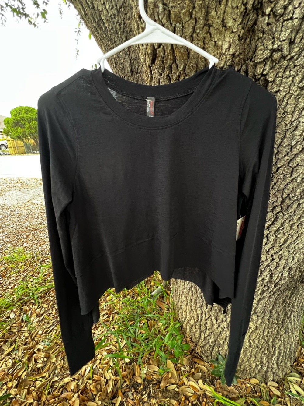 Free People FP Movement Tempo Long Sleeve Tee Size XS black flowy top NWT